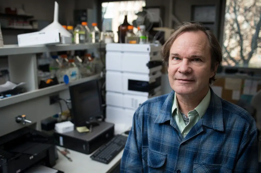 Johnathan Walton, director of the Great Lakes Bioenergy Research Center, poses in his lab on Wednesday November 21, 2012.