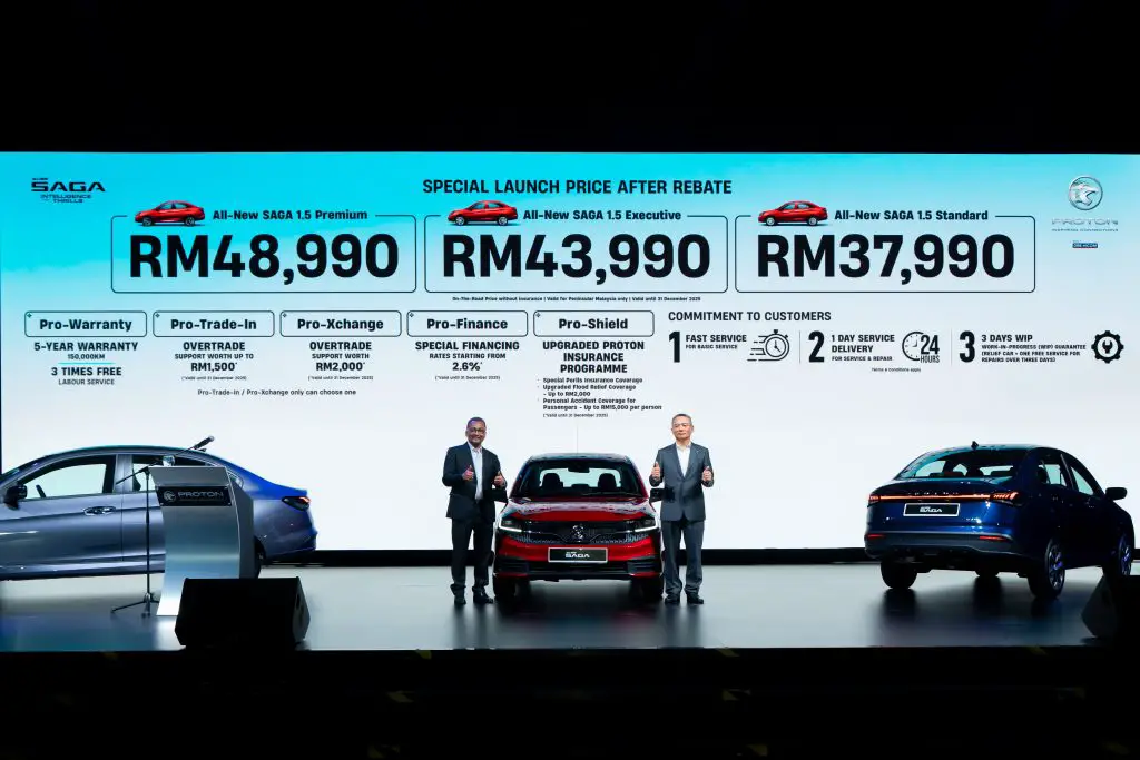 PROTON Chief Executive Officer Dr. Li Chunrong (right) and Dato' Ir. Abdul Rashid Musa, Deputy Chief Executive Officer of Proton, stand with the All-New Saga at the unveiling of the launch package and Peninsular Malaysia pricing.