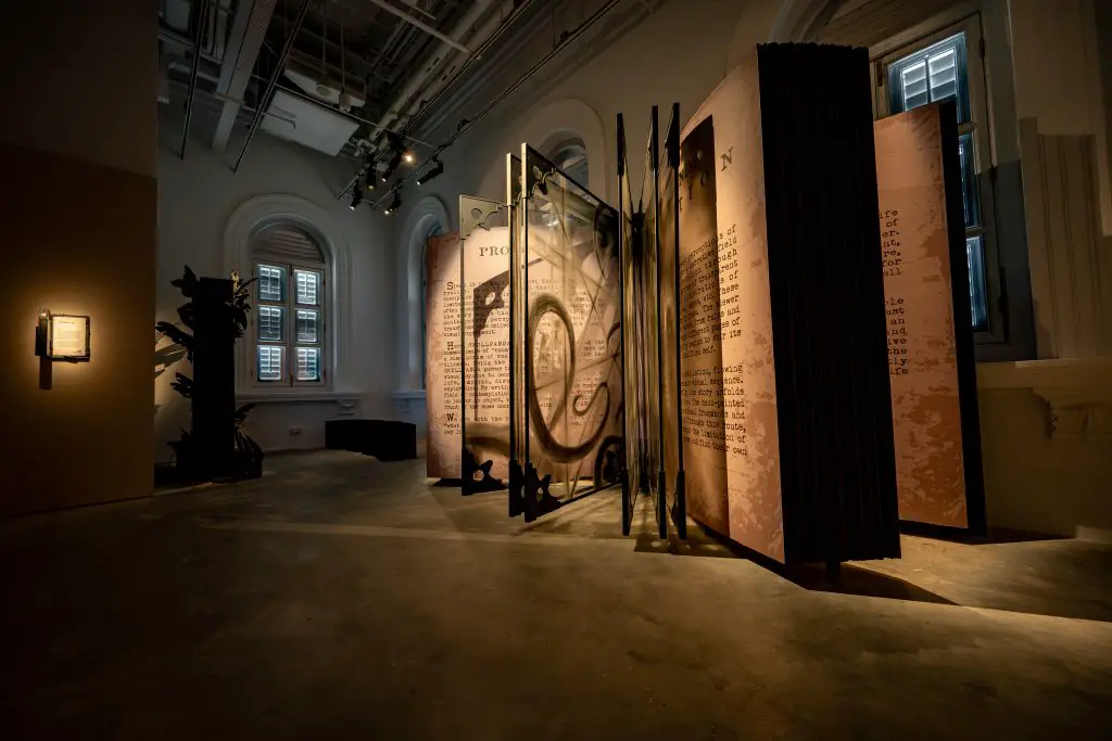 Transparent book pages installation in the Direction zone at Skullpanda Cage-Uncage Singapore.