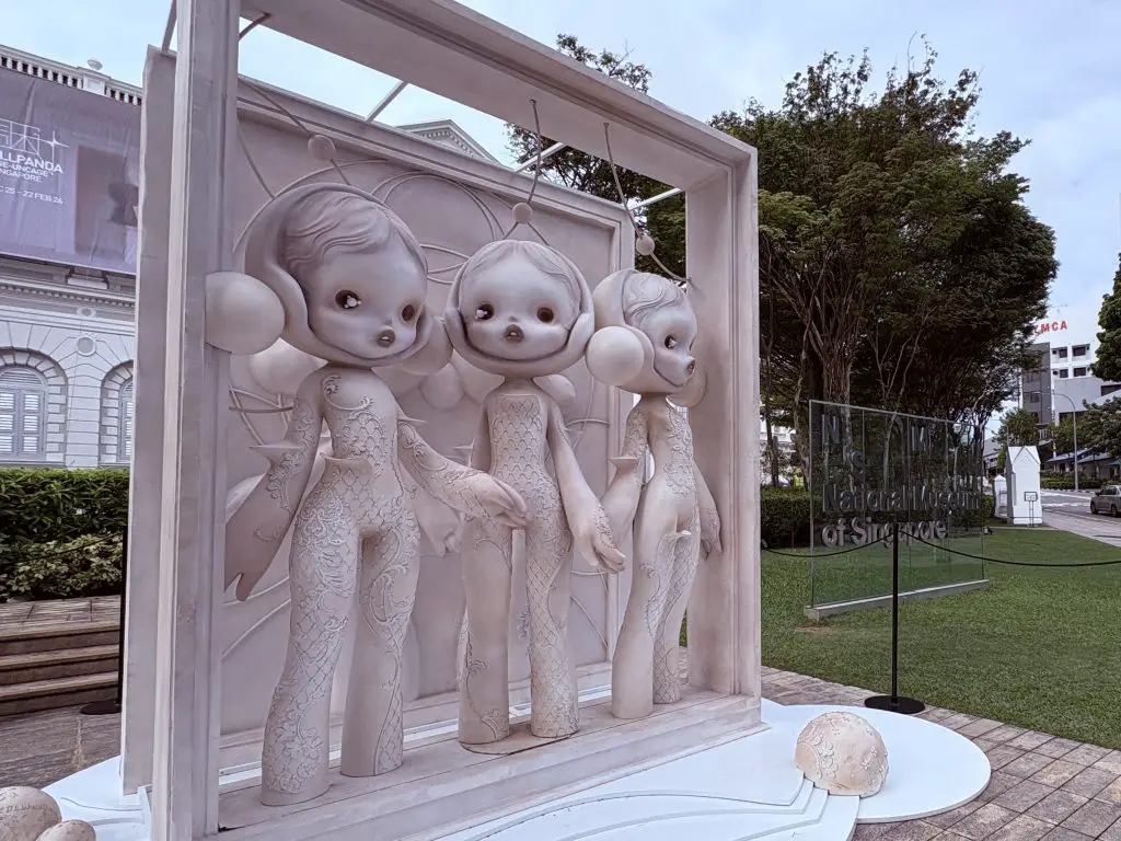 Large Skullpanda sculpture displayed on the front lawn of the National Museum of Singapore during the Cage-Uncage exhibition.