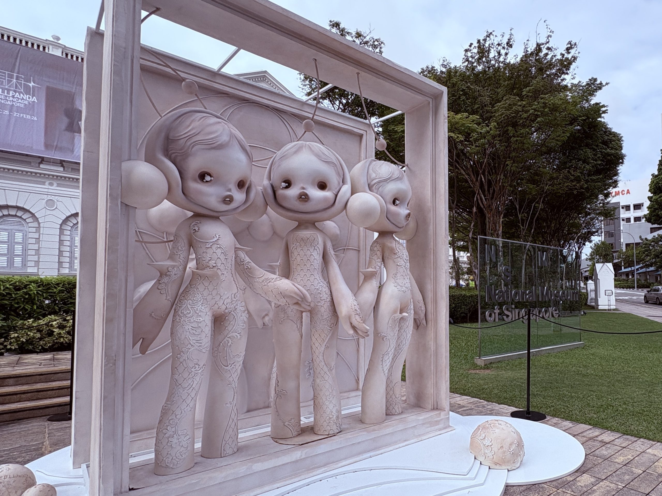 Large Skullpanda sculpture displayed on the front lawn of the National Museum of Singapore during the Cage-Uncage exhibition.