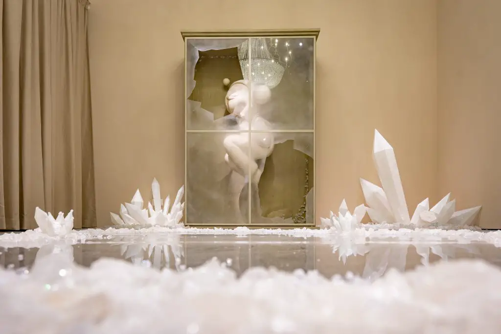 Fortune zone with mirrored surfaces and a central Skullpanda sculpture inside the Cage-Uncage Singapore showcase.